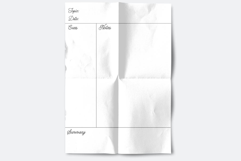 Cornell Notes template with elegant script-style headings and a clean layout, shown on folded paper with cue, notes, and summary sections