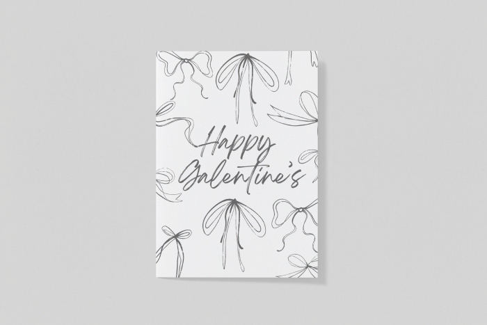 A white Galentine's card decorated with black line-art sketches of various ribbons and bows with "Happy Galentine's" in script.