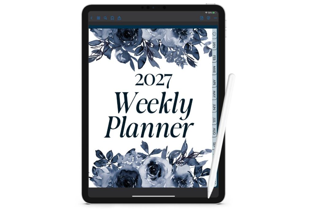2027 digital weekly planner displayed on a tablet, with blue watercolor flowers, dark navy typography, and monthly navigation tabs.