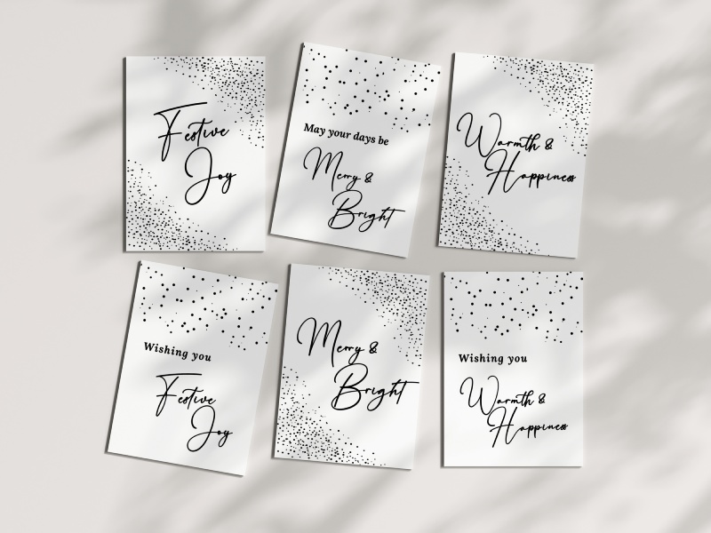 Black and white printable Christmas cards with script lettering and scattered dot patterns.