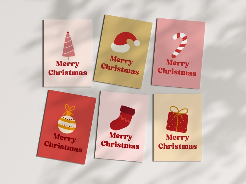 Colorful printable Christmas cards featuring minimalist Christmas trees, Santa hats, candy canes, ornaments, and stockings.